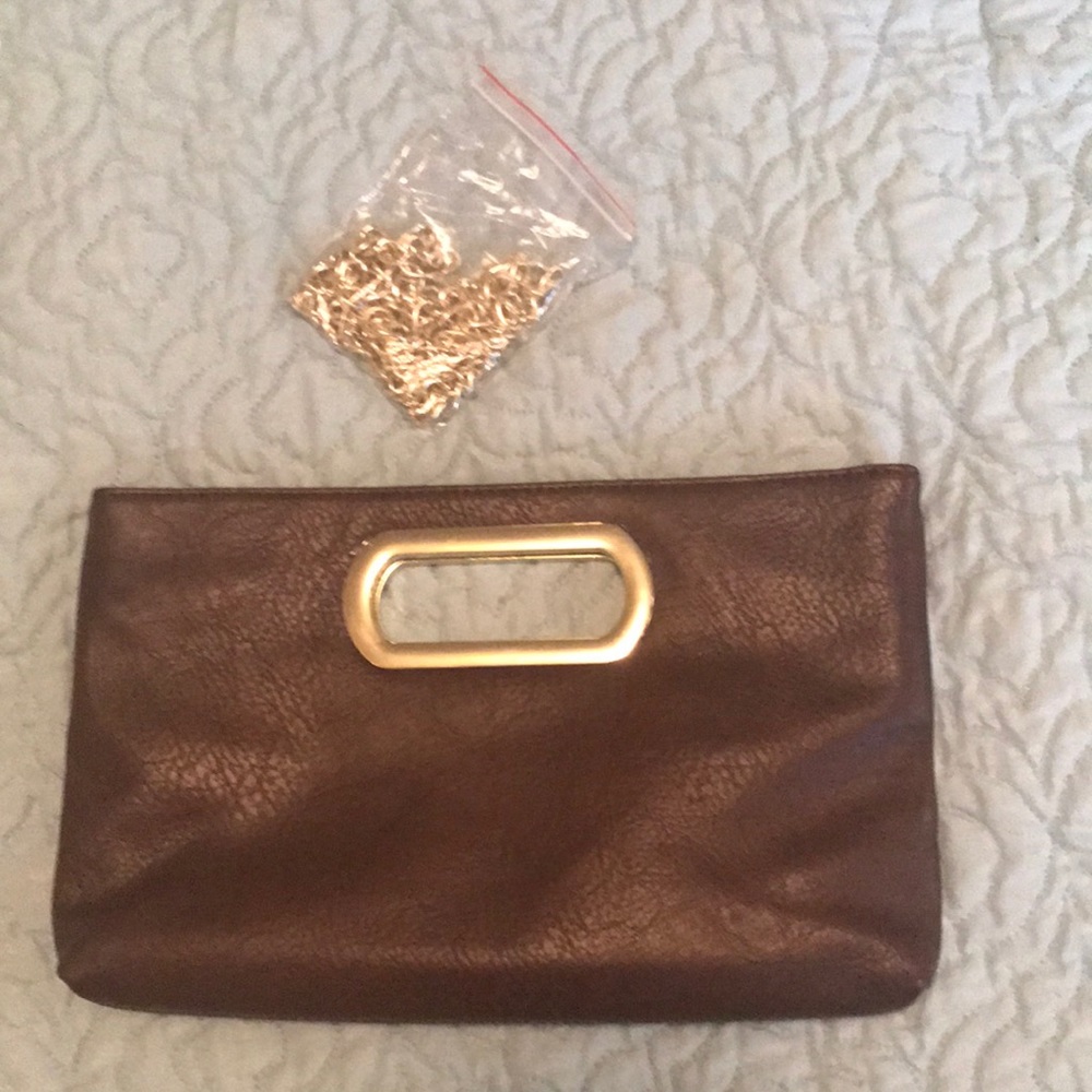 Clutch/crossbody convertible bag